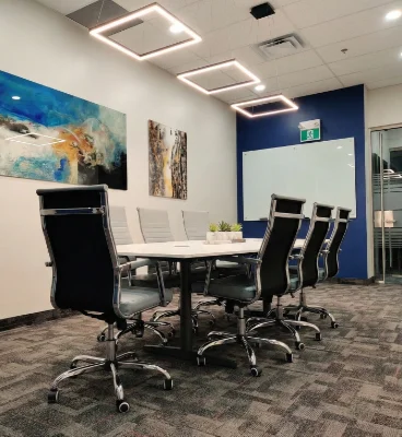 boardroom oshawa 368x400 Modern conference room with six chairs and art